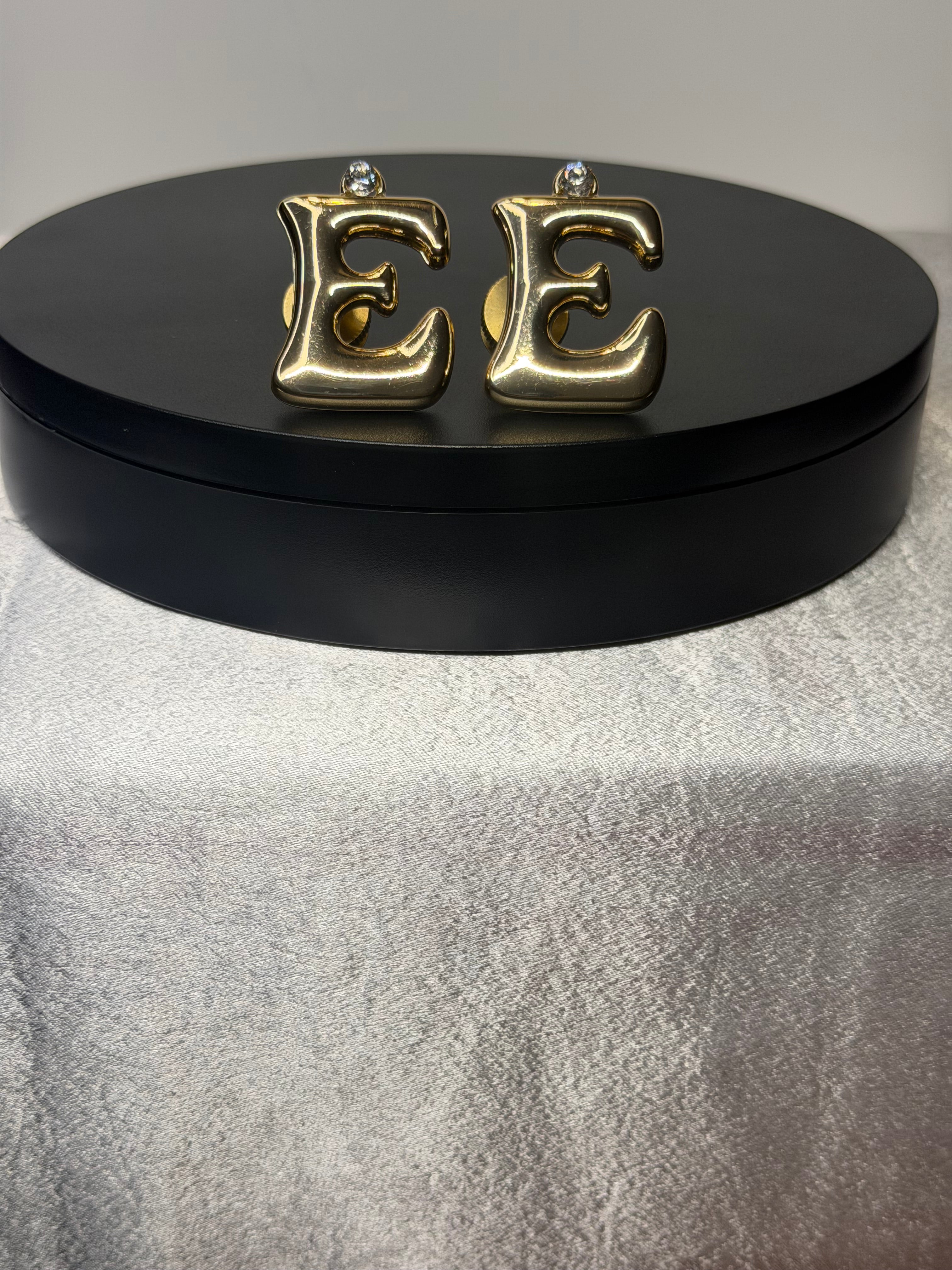 Gold E